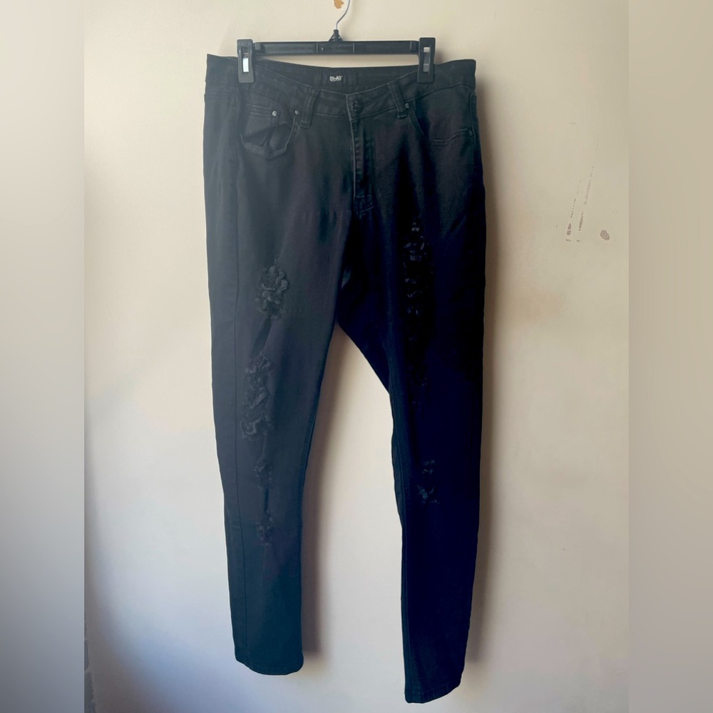 Black ripped stretch skinny jeans